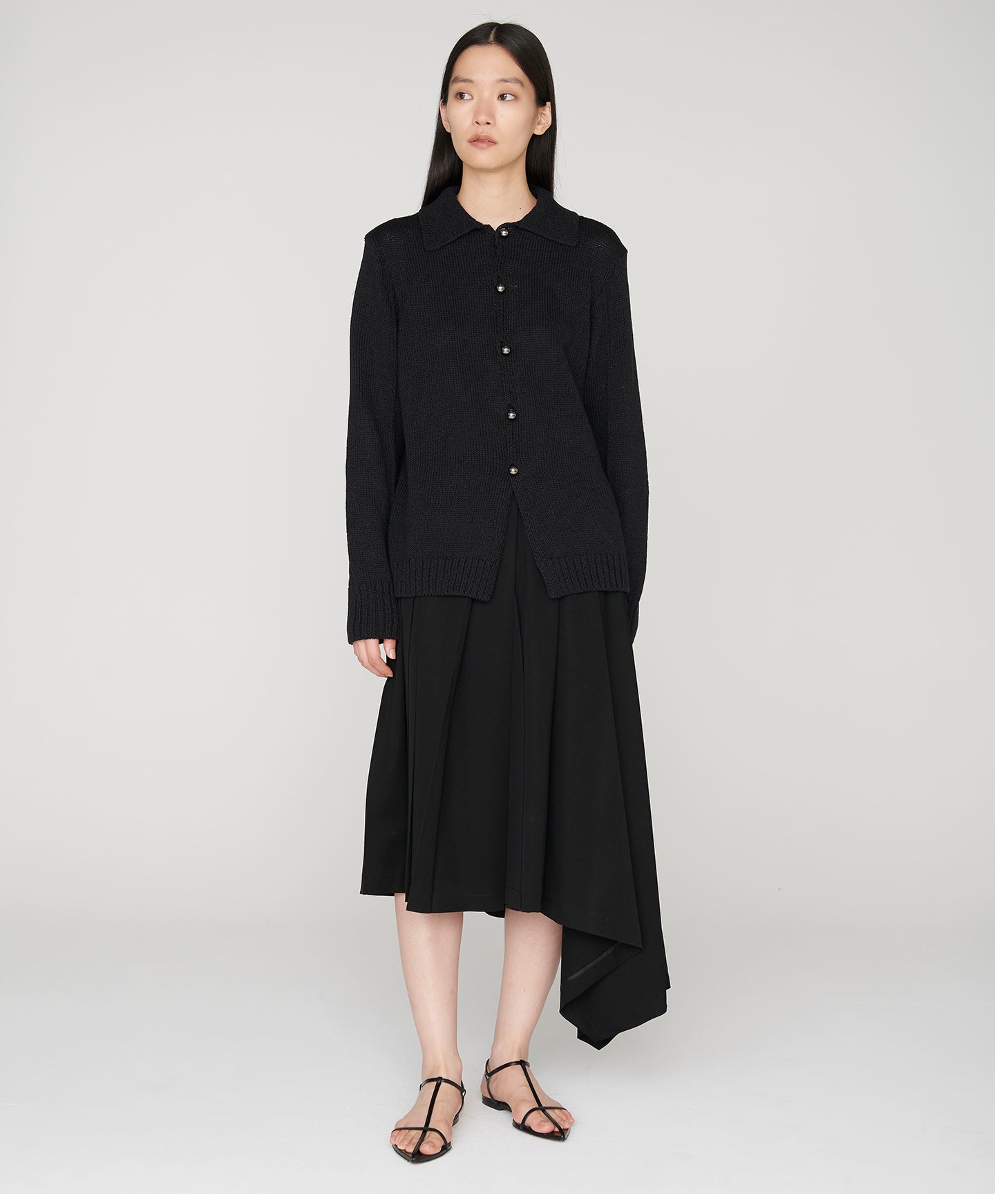 WOOL GABARDINE / PLEATED ASYMMETRY SKIRT