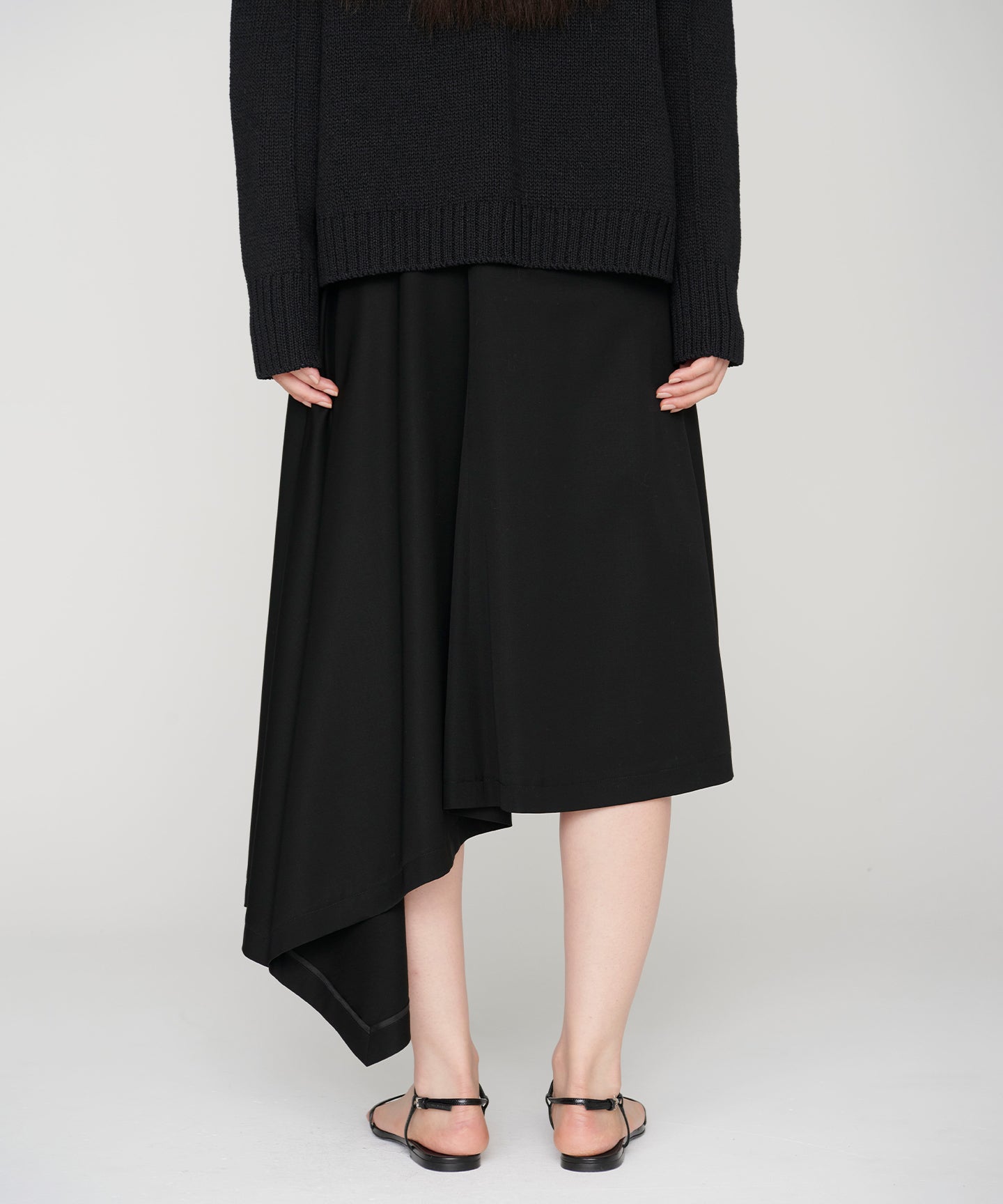 WOOL GABARDINE / PLEATED ASYMMETRY SKIRT
